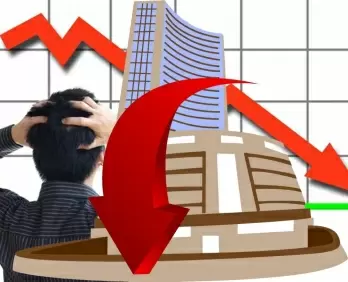 Equity indices trade lower; Sensex down by over 450 pts